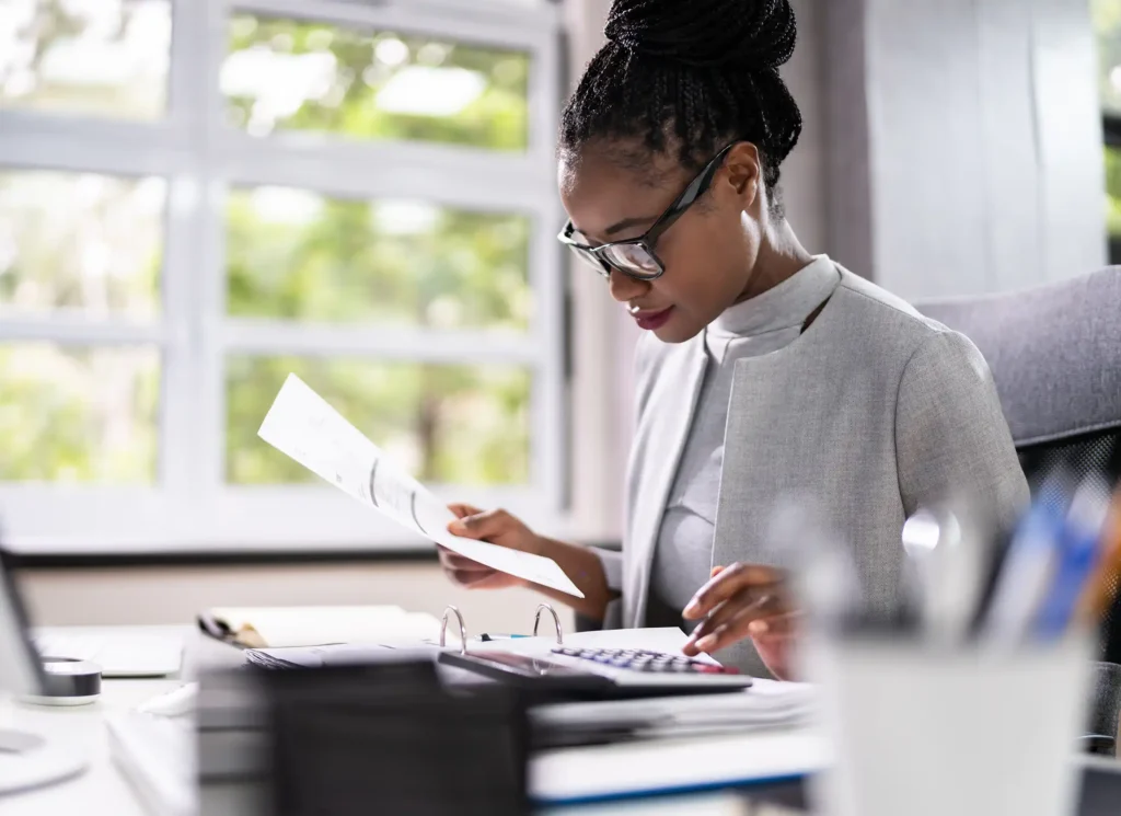 accountant working with calculator
